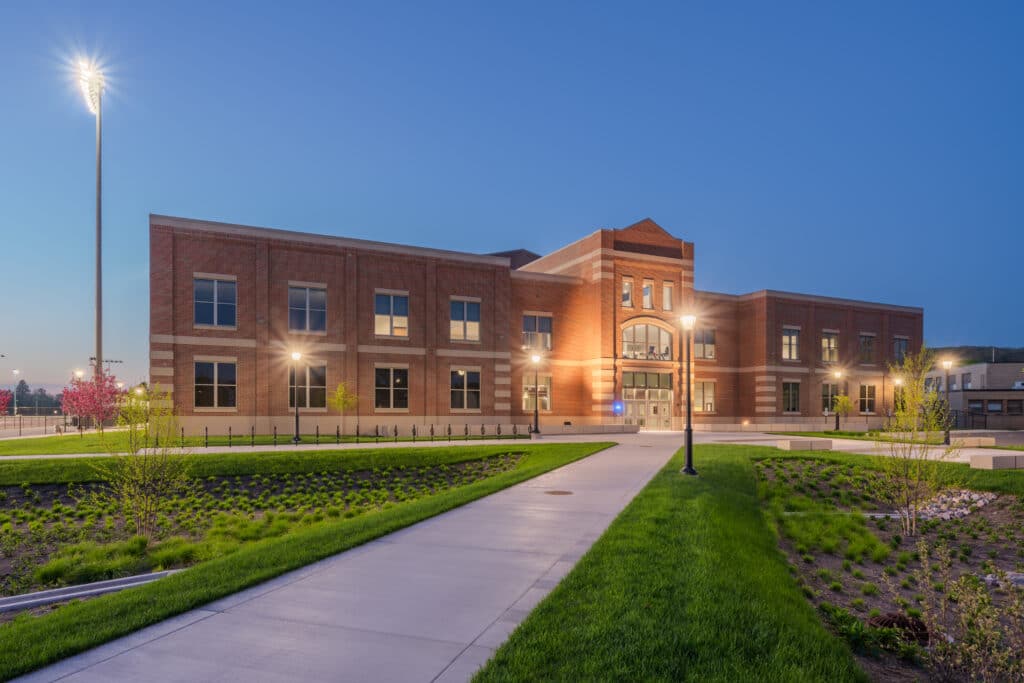 UWL Fieldhouse exterior twilight image designed by HSR
