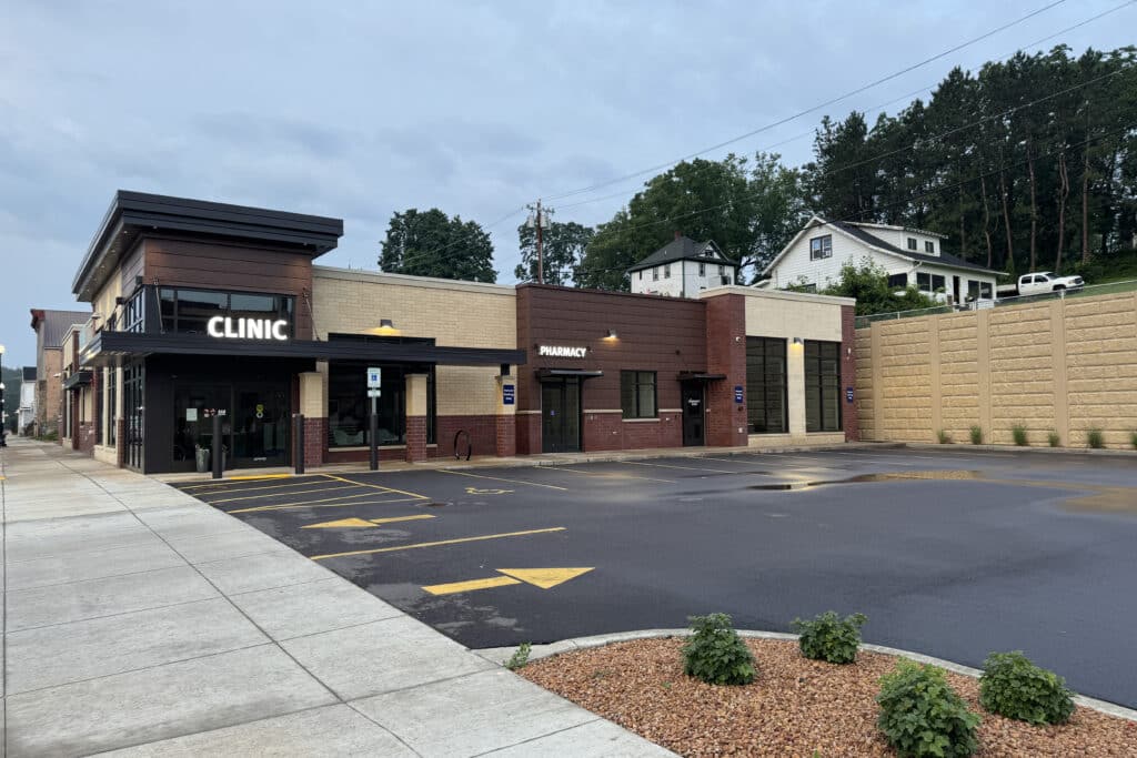 Additional sidewalk view of from entrance to Elroy Clinic designed by HSR