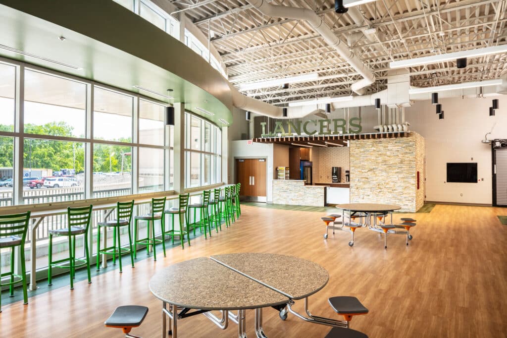 Interior La Crescent High School Commons Addition with lots of windows and natural light designed by HSR