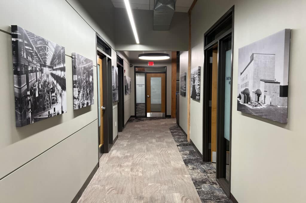 Marine Credit Union renovation hallway with historic artwork