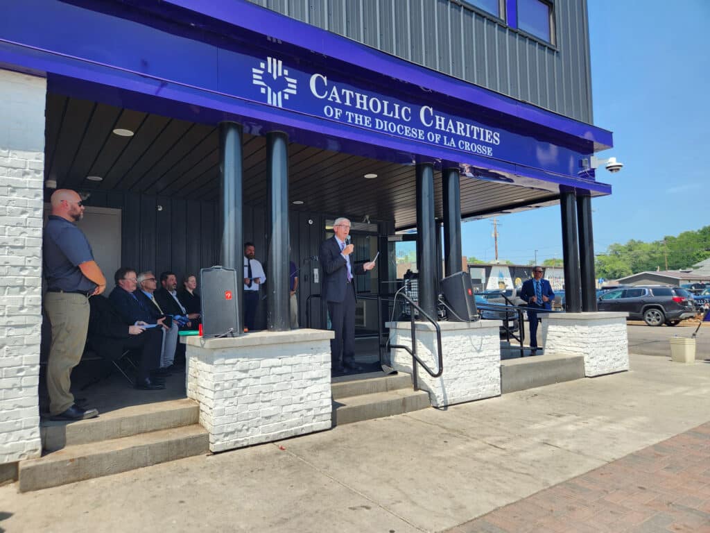 Exterior front entrance during ribbon cutting of Sojourner House Addition designed by HSR
