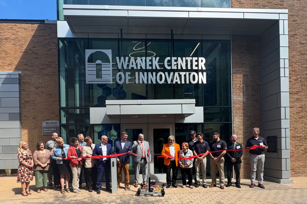 WTC Wanek Innovation Center Exterior Entry showing people for ribbon cutting